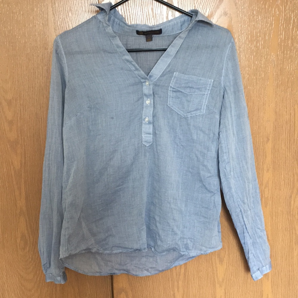 Blue and white striped shirt.